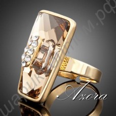 Блестящее асимметричное позолоченное кольцо с крупным тёмно-жёлтым камнем