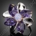 Удивительное колечко фиолетового цвета в виде цветка с лепестками из фианитов